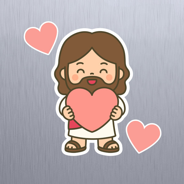Jesus chibi cartoon character holding a heart with 2 matching pink hearts on a gray background. Cute Jesus 3 piece set fridge magnet decorative set